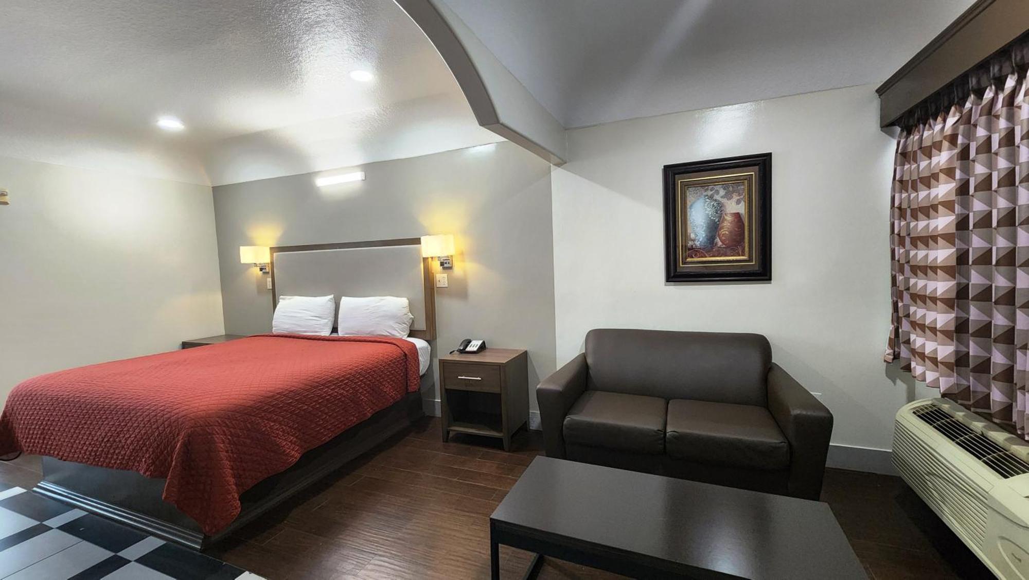 Scottish Inn & Suites Sam Houston Parkway Ngoại thất bức ảnh