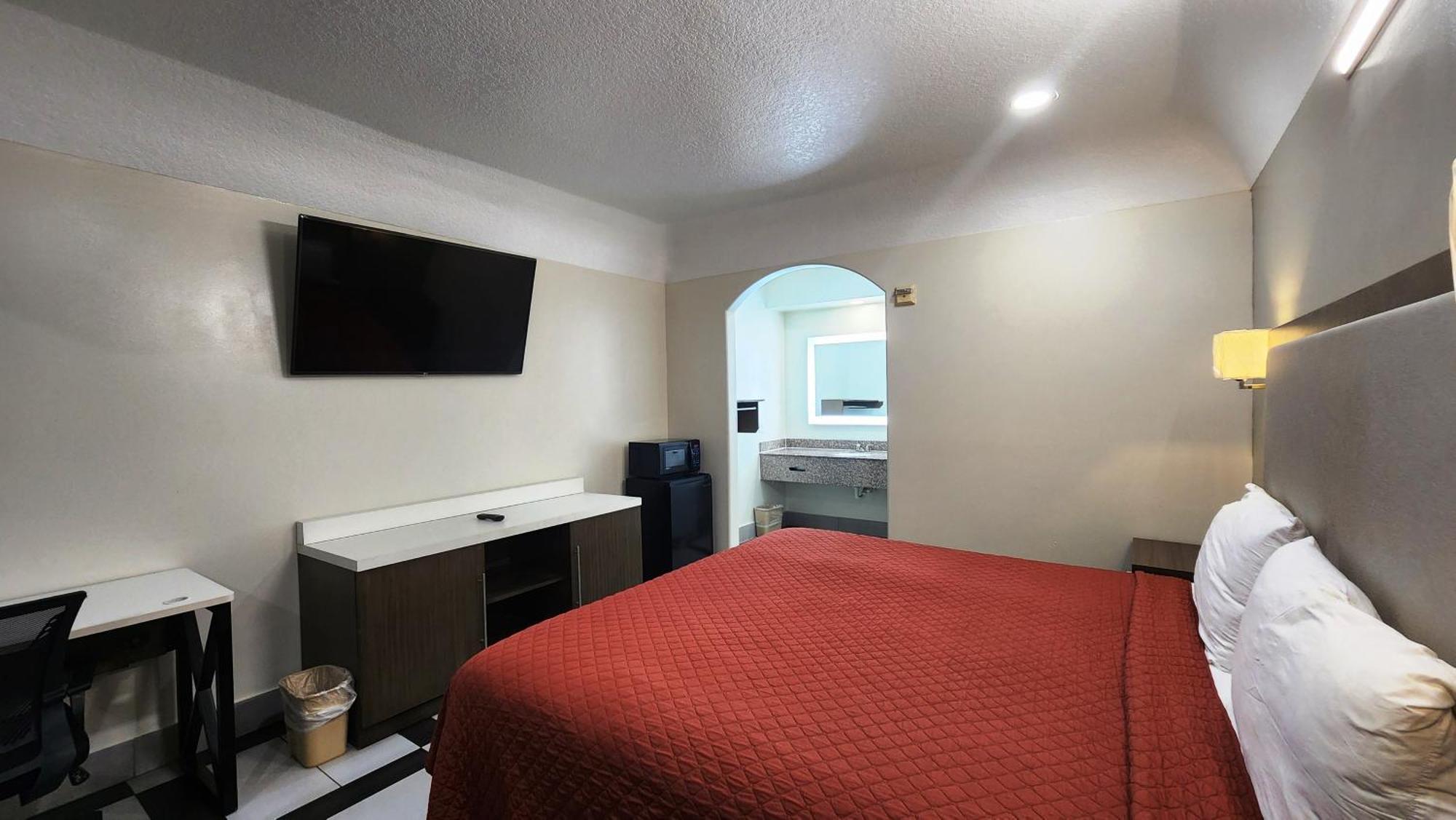 Scottish Inn & Suites Sam Houston Parkway Ngoại thất bức ảnh