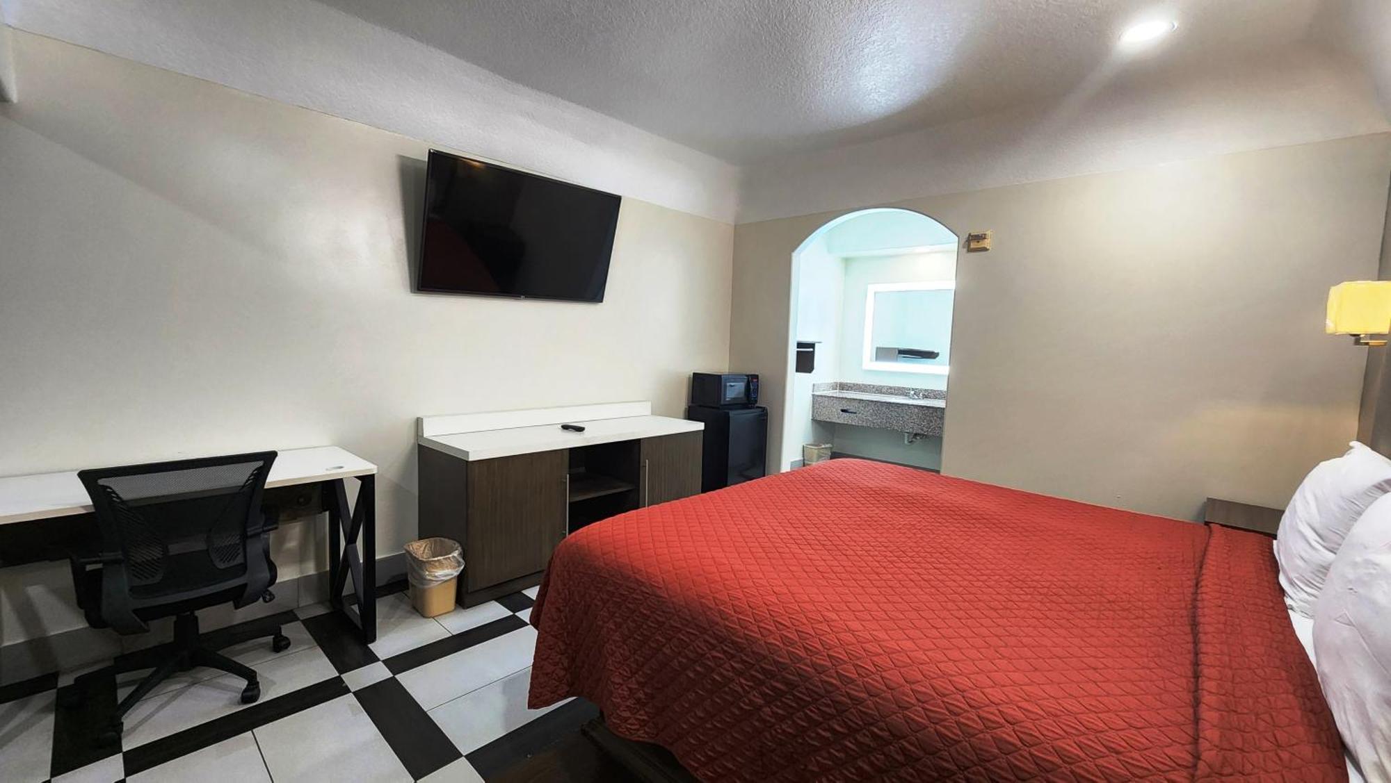 Scottish Inn & Suites Sam Houston Parkway Ngoại thất bức ảnh